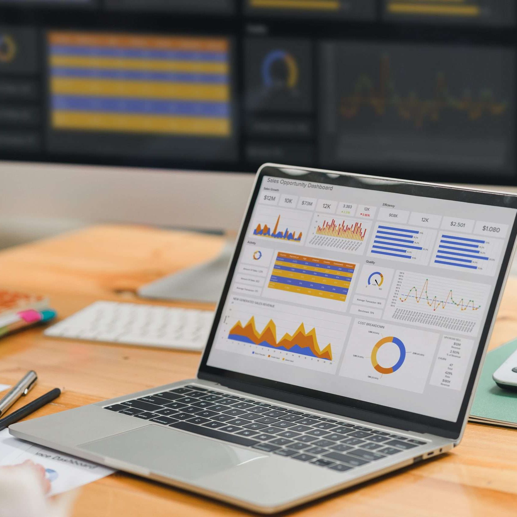 A businesswoman or accountant using laptop to analyze financial investments and business and marketing growth on a data graph. The concepts of accounting, economics, and commercial analysis